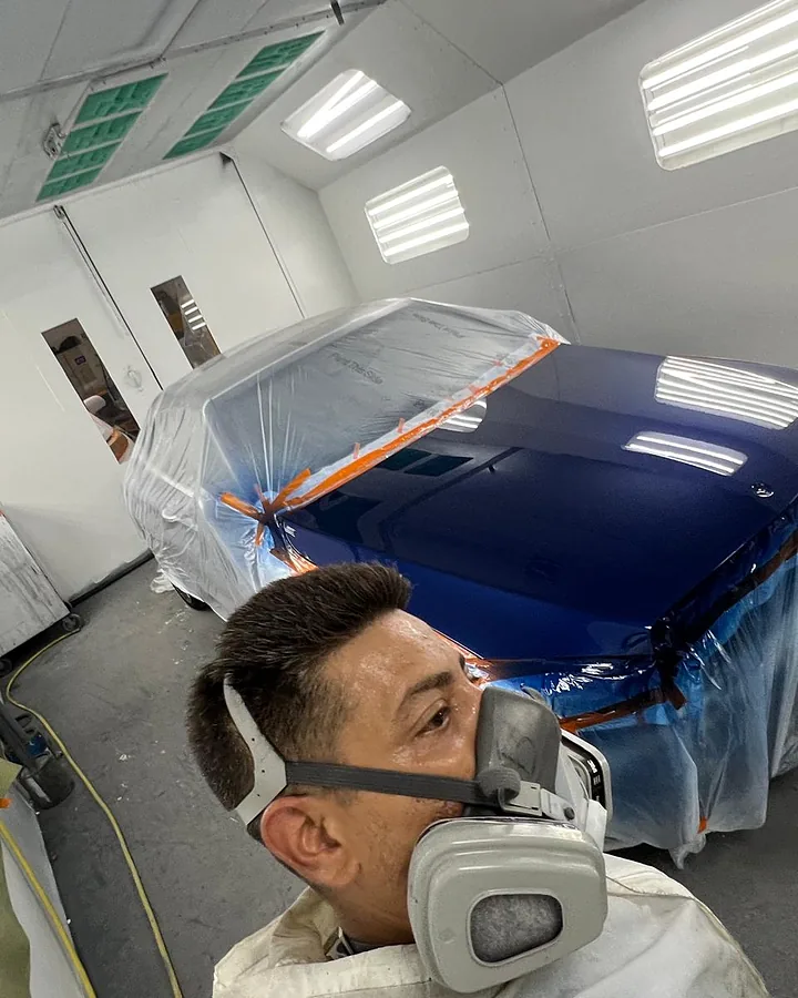 Car painting in a spray booth